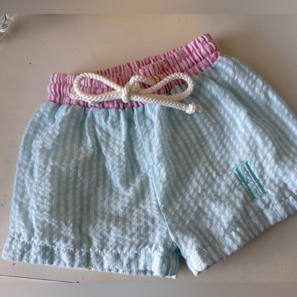 Cecil and Lou "H" Monogrammed Seersucker Swimshorts.